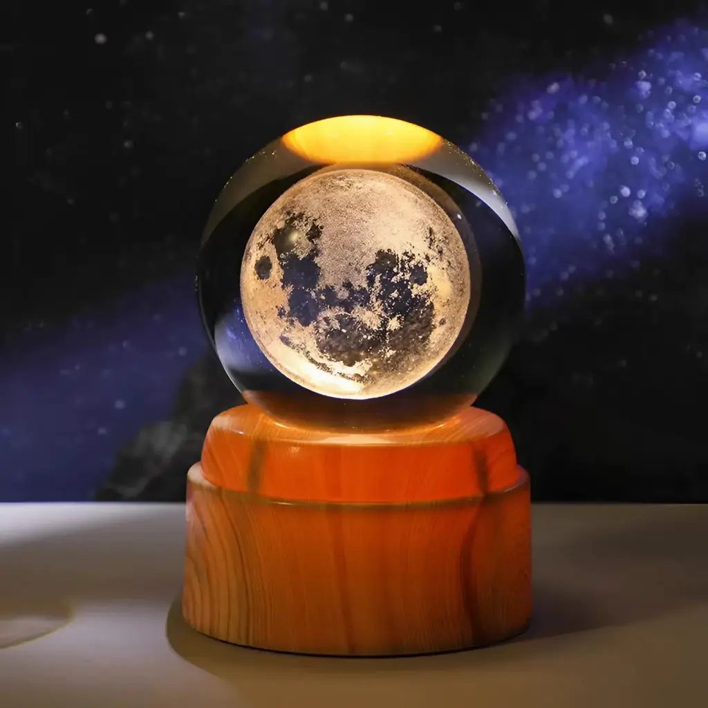 Foto de LAMPARA ESFERA DE VIDRIO GIRATORIA- LUNA LLENA 6 CM.